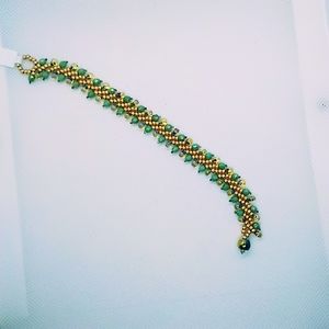 Turquoise and Gold hand beaded bracelet.